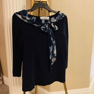 Women’s 3/4 sleeve dress blouse.